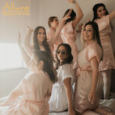 Bride and bridesmaids relaxing together before a bachelorette party.